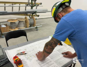Custom Sheet Metal Fabrication and HVAC Crew Coordinating On Site